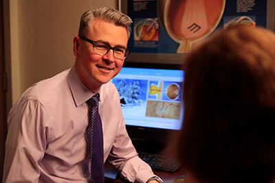 Dr. Tom Obertynski and a Patient